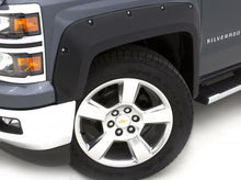 Load image into Gallery viewer, Lund 10-17 Dodge Ram 2500 RX-Rivet Style Textured Elite Series Fender Flares - Black (2 Pc.)